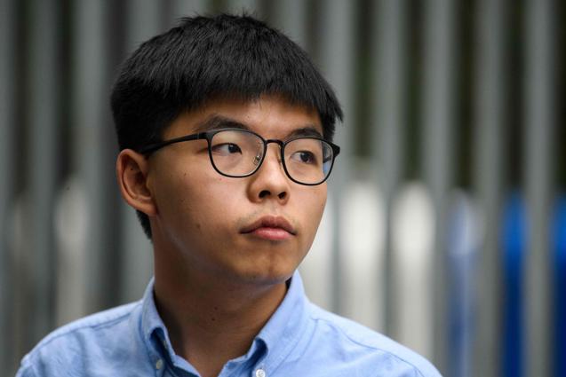 Hong Kong, il dissidente Joshua Wong afferma che si dichiarerà colpevole