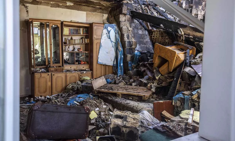 Guerra in Ucraina, rinvenuti 44 corpi di civili sotto un palazzo a Izyun